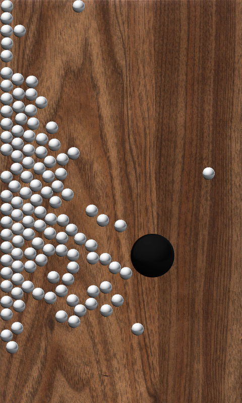 Roll Balls into a hole Game Screenshot